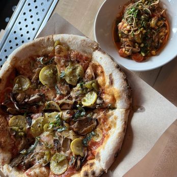 Indaco signature dishes Black Pepper TagliatelleProsciutto PizzaBurrata